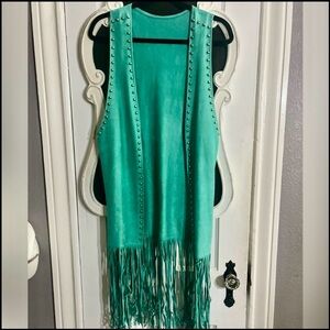 TURQUOISE SUEDE FRING VEST “CRAZY TRAIN” SILVER STUD TRIM ON FRONT SIDES ARM HOL